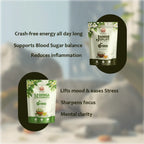 Two stand-up pouches of herbal supplement foods are shown on a softly blurred outdoor background with marketing text. The top-right pouch reads Jasmine Uplift and the bottom-left pouch reads Moringa Superfoods, each with green and white packaging and a dark oval behind it.