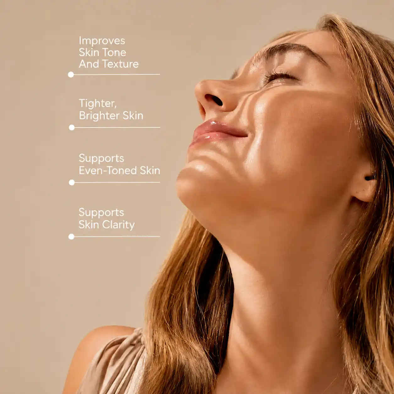 Close-up of a woman with closed eyes and a serene expression, showing radiant skin with dramatic shadow play across her face. White text on the left lists skincare benefits: 'Improves Skin Tone And Texture', 'Tighter, Brighter Skin', 'Supports Even-Toned Skin', and 'Supports Skin Clarity'.